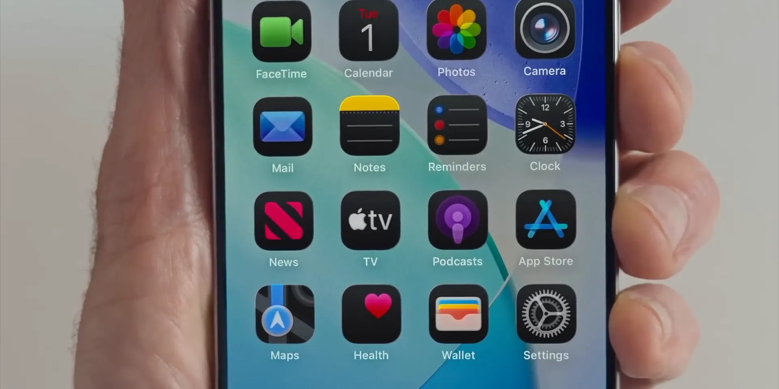 iOS 26 Liquid Glass design with transparent UI elements
