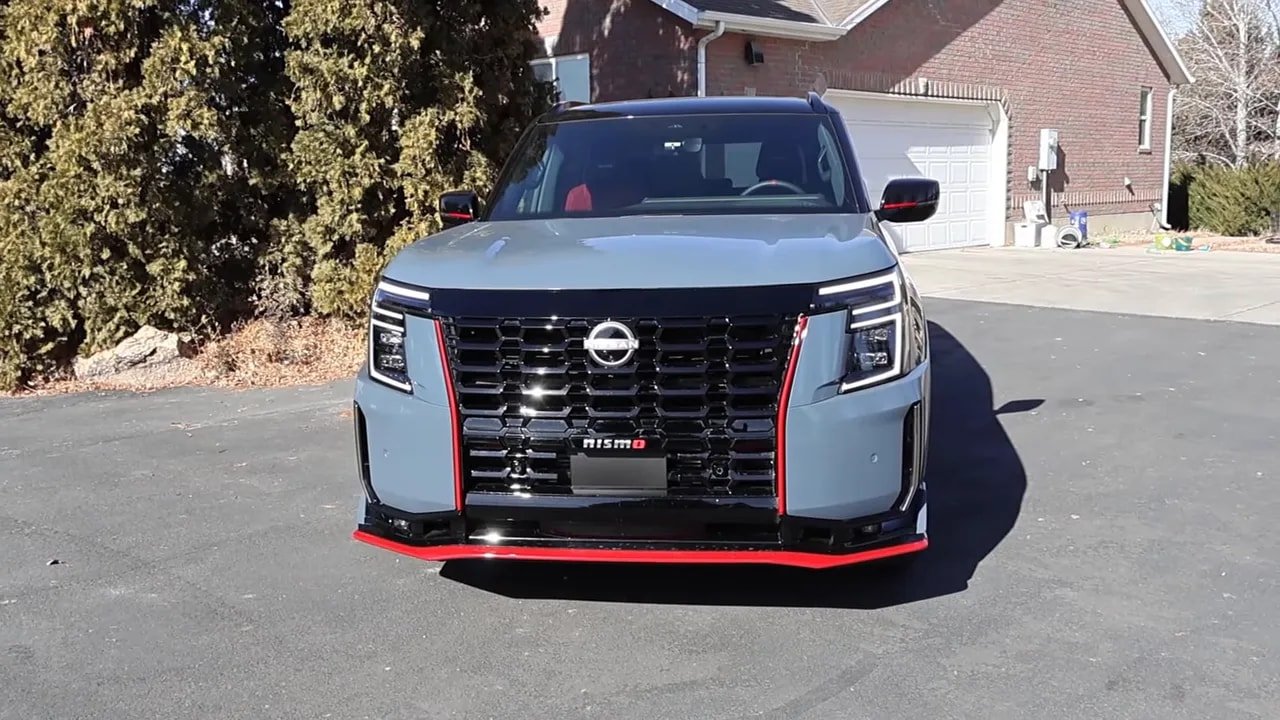 2026 Nissan Armada Nismo front view showcasing grille, LED lights and red trim